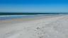 Enjoy 100 feet of private beach on Longboat Key's widest section of newly enhanced beach