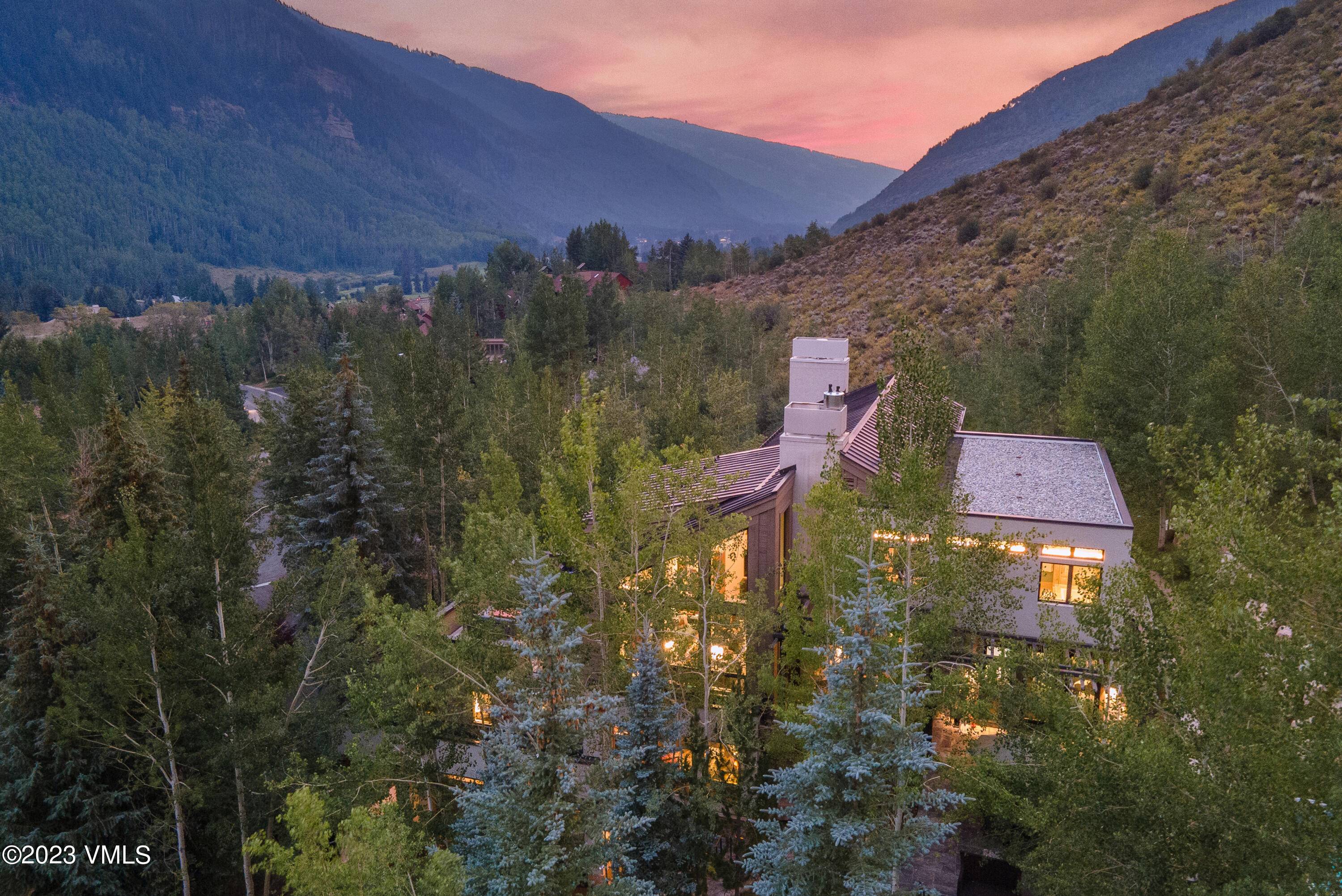 Tucked away in Vail's alpine landscape, an entertainer's mountain dream home offers a warm, stylish welcome.