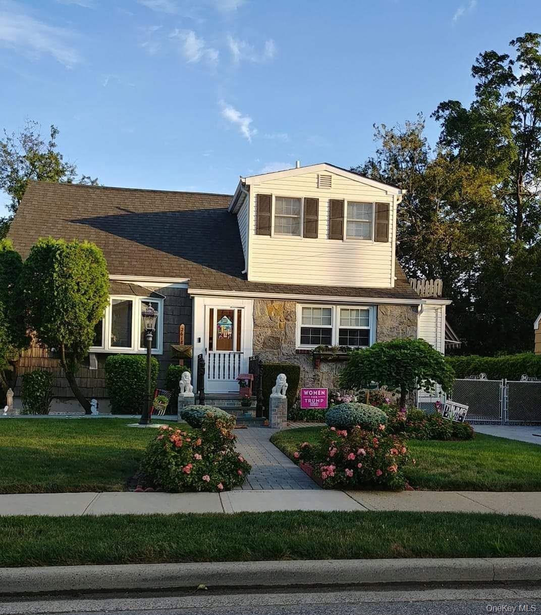 Fieldstone Front With Partial Front Dormer Complimenting Full Rear Dormer