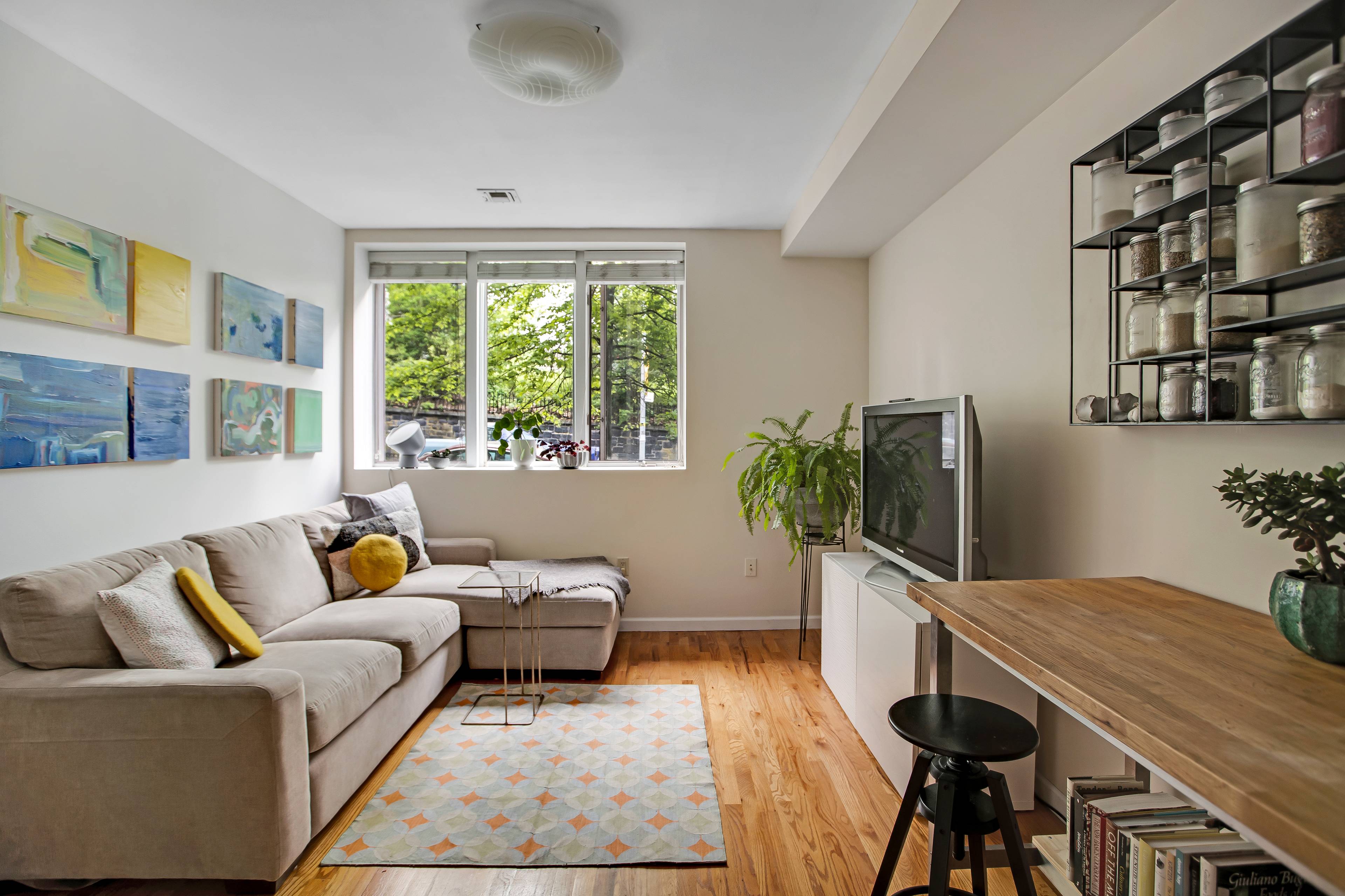 Located on the most picturesque block in Greenwood Heights, this duplex with an expansive, 420 square feet private yard is the townhouse alternative you've been looking for !