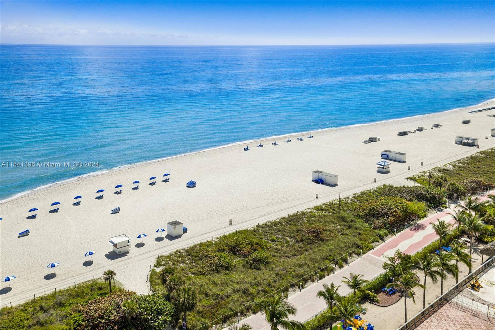 Indulge in coastal luxury at this oceanfront corner condo, refurbished to perfection in 2023.