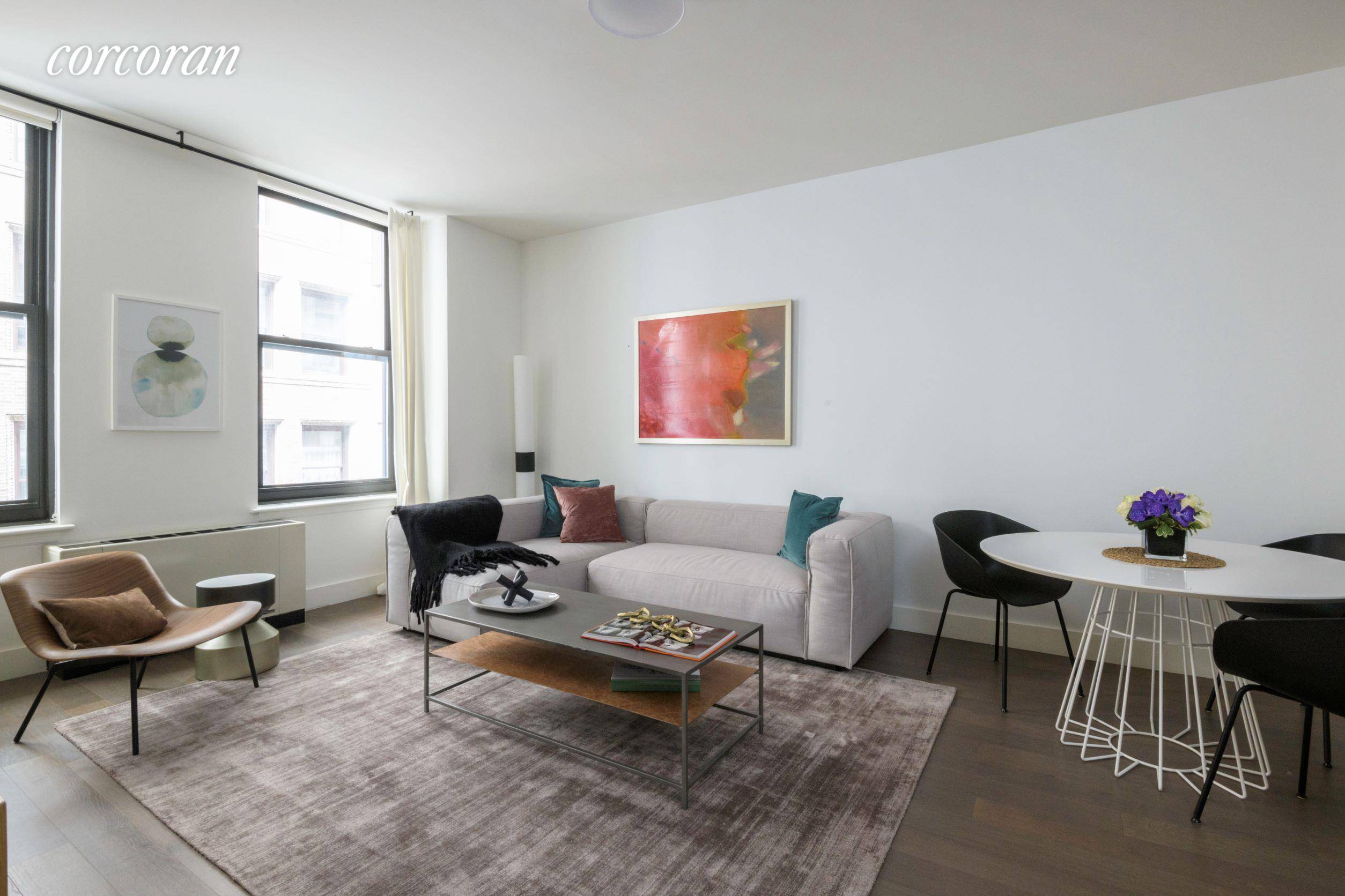IMMEDIATE OCCUPANCY. Welcome to the Broad Exchange Building, where the timeless grandeur of New York's storied past meets spacious, sophisticated, and modern residences that are ideal for contemporary living.