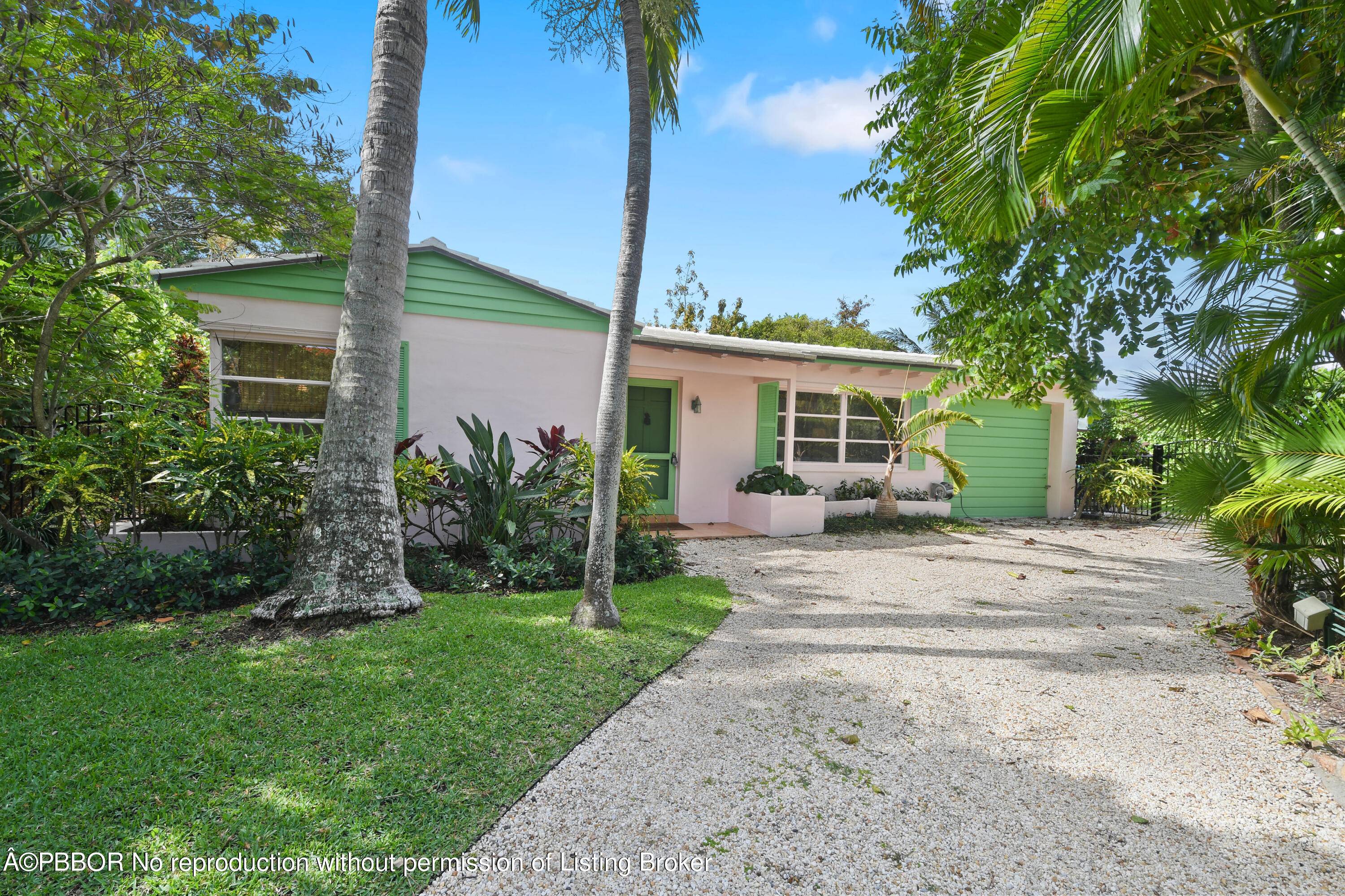 This quintessential Palm Beach Bungalow represents a singular opportunity on one of Palm Beach Island's most idyllic North End lanes.