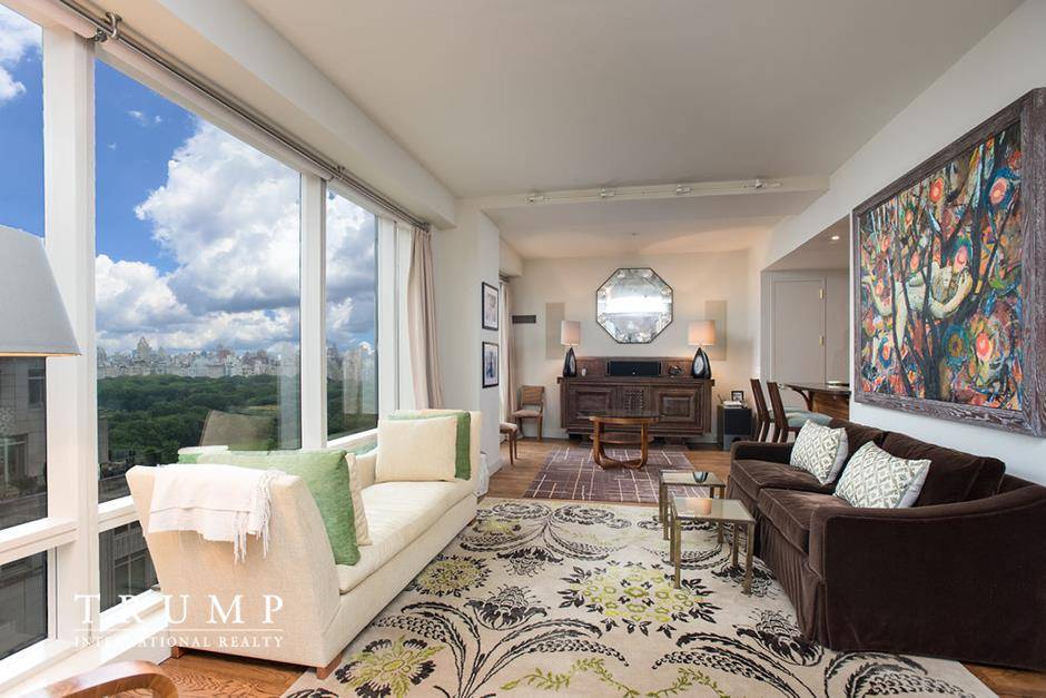 Unit 23G is a charming two bedroom home with lovely views of both the city and Central Park !