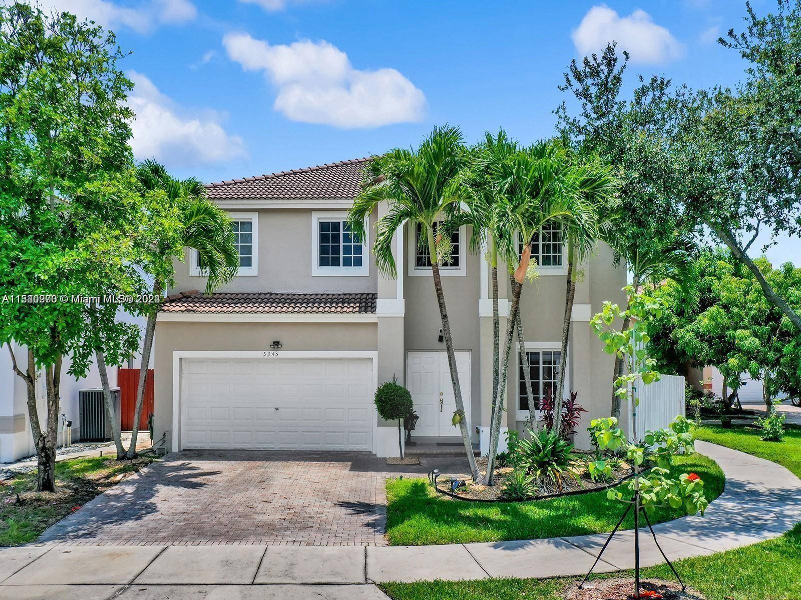 STOP, THIS IS IT ! 2 story corner home with spacious 4 beds, 4 baths, 2 car garage and large pool with covered patio in gated Doral Gardens.