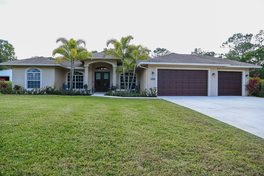 Welcome to the most spacious 2017 pool home with the best elevation in all of Jupiter Farms.