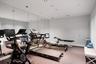 Gym with recessed lighting and baseboards