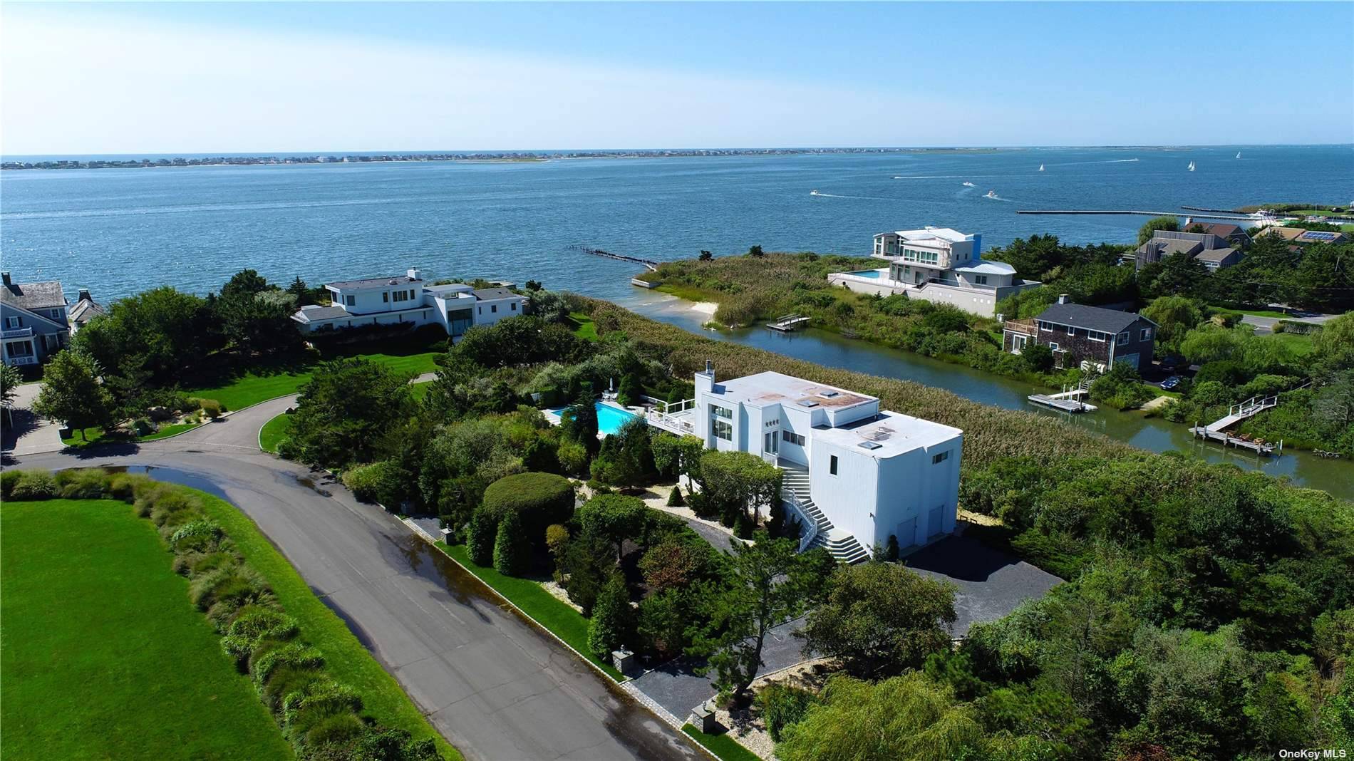 Chic and modern, this upside down open concept waterfront property takes advantage of the panoramic vistas over Moriches Bay.