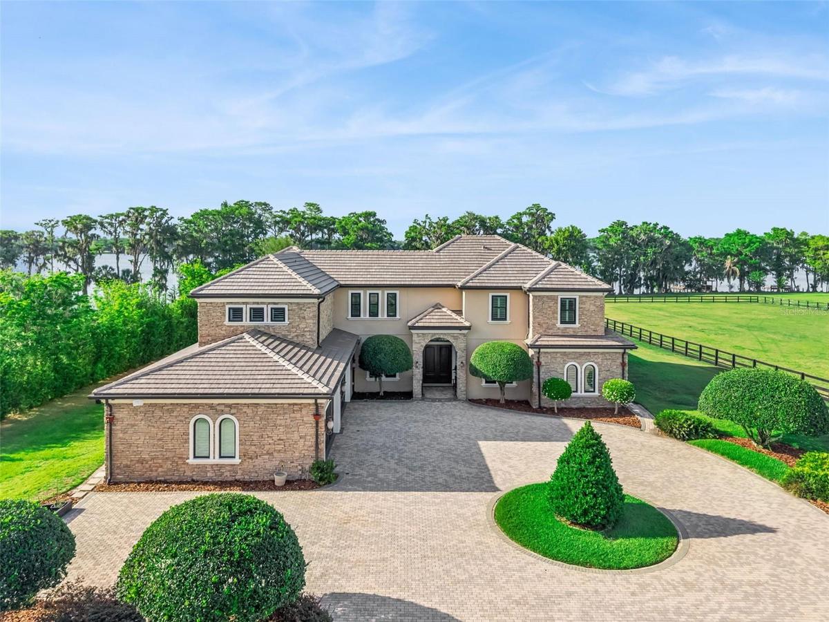 Privately Gated 7.22 Acres. Lakefront Estate on the private 239 acre “Lake