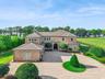 Privately Gated 7.22 Acres. Lakefront Estate on the private 239 acre “Lake