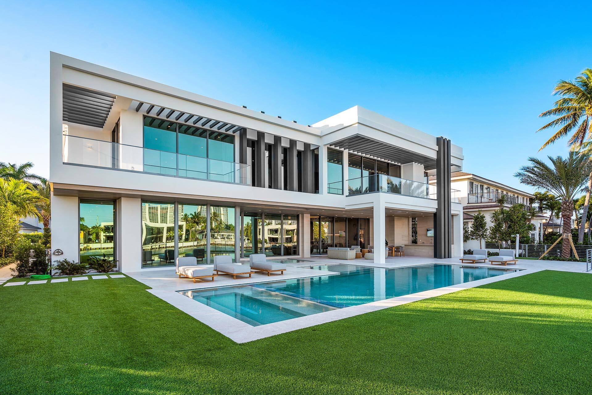 Built by Sarkela Corporation and Randall Stofft architecture, this extraordinary Intracoastal property has over 9, 600 sf of living space, 6 bedrooms, 7 full and 2 half bathrooms.