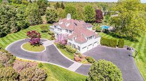 The epitome of elegance, this spectacular estate is perched on one of the highest points in Darien with stunning vistas overlooking a scenic golf course.