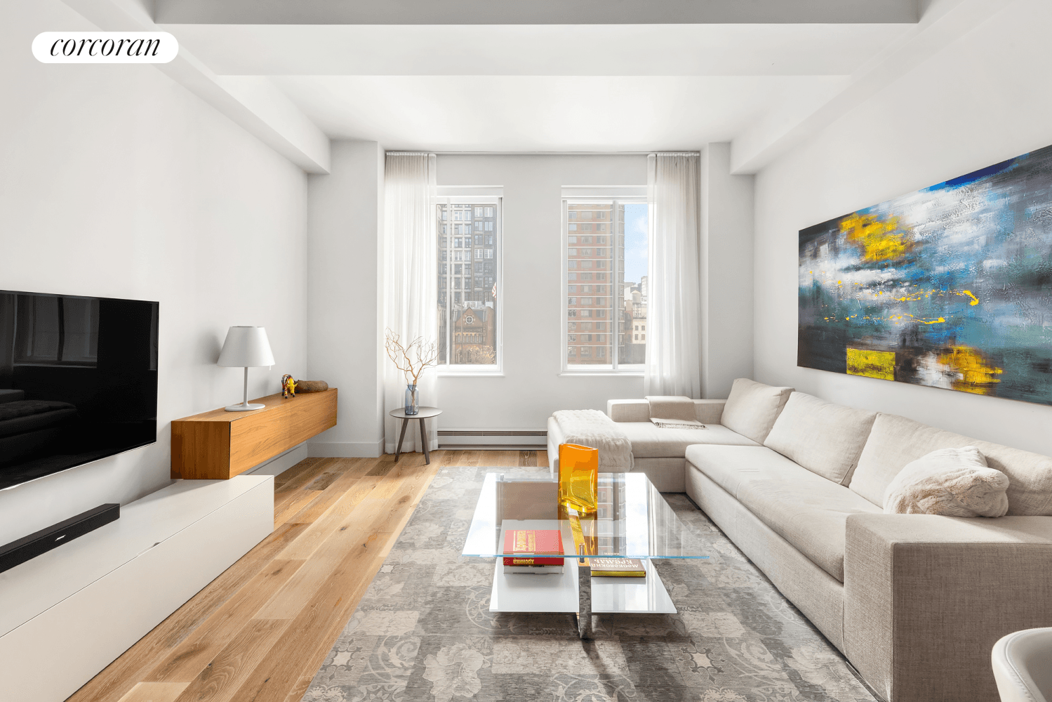 Sun drenched with open city views, residence 506 is one of the rarely available two bedroom units with all south facing windows at 93 Worth St.