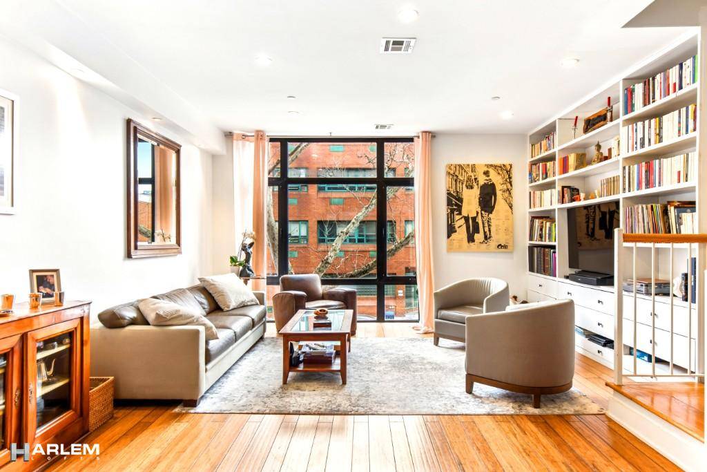 This gorgeous five floor Two Family Townhouse brings all the comforts of contemporary living to the rich culture of Central Harlem.