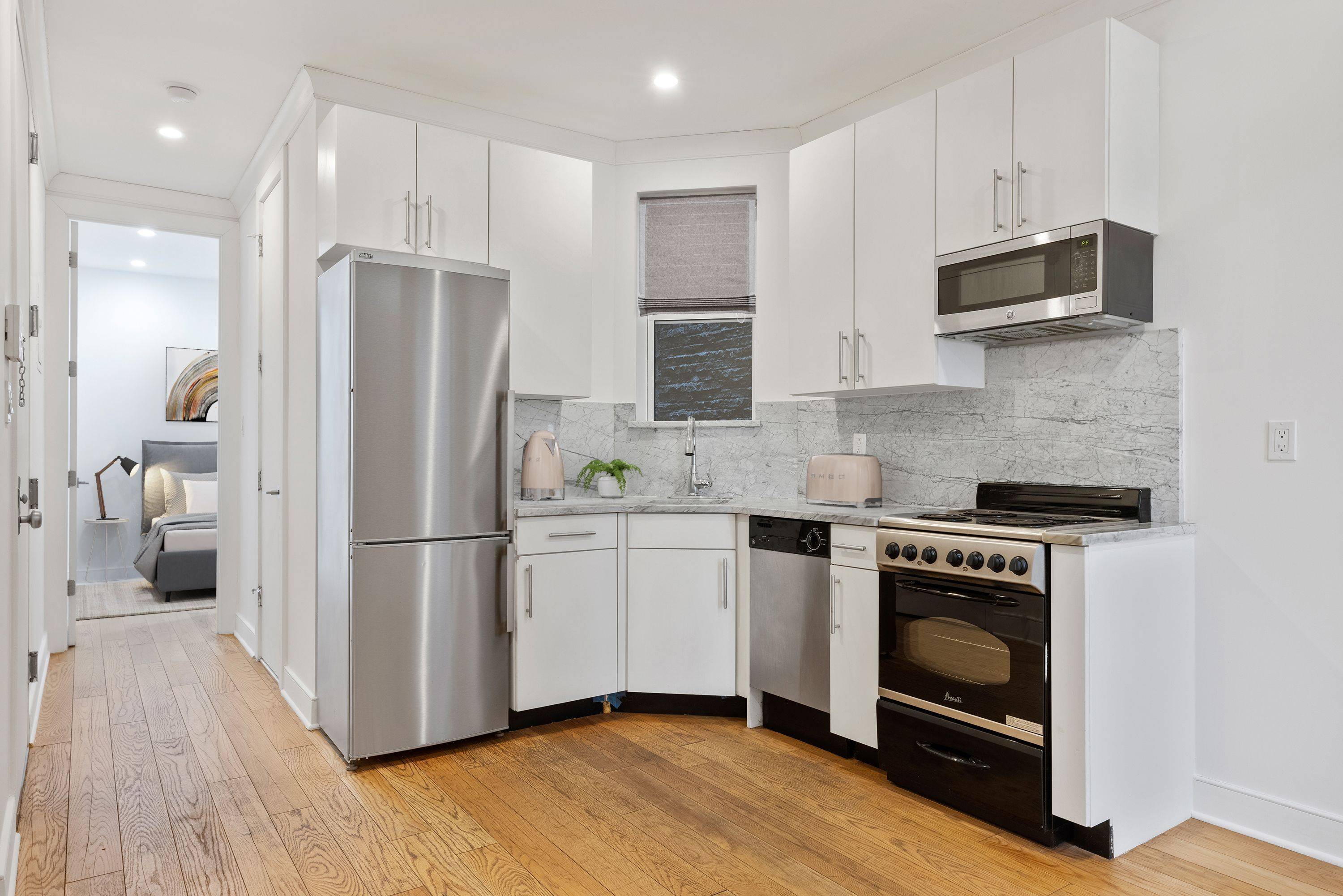 Beautiful 3 bedroom, 1 full bath residence featuring stainless steel appliances, granite countertops, designer details, renovated marble bathrooms with Kohler fixtures and a personal video intercom system.