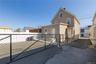 View of front of house featuring a gate