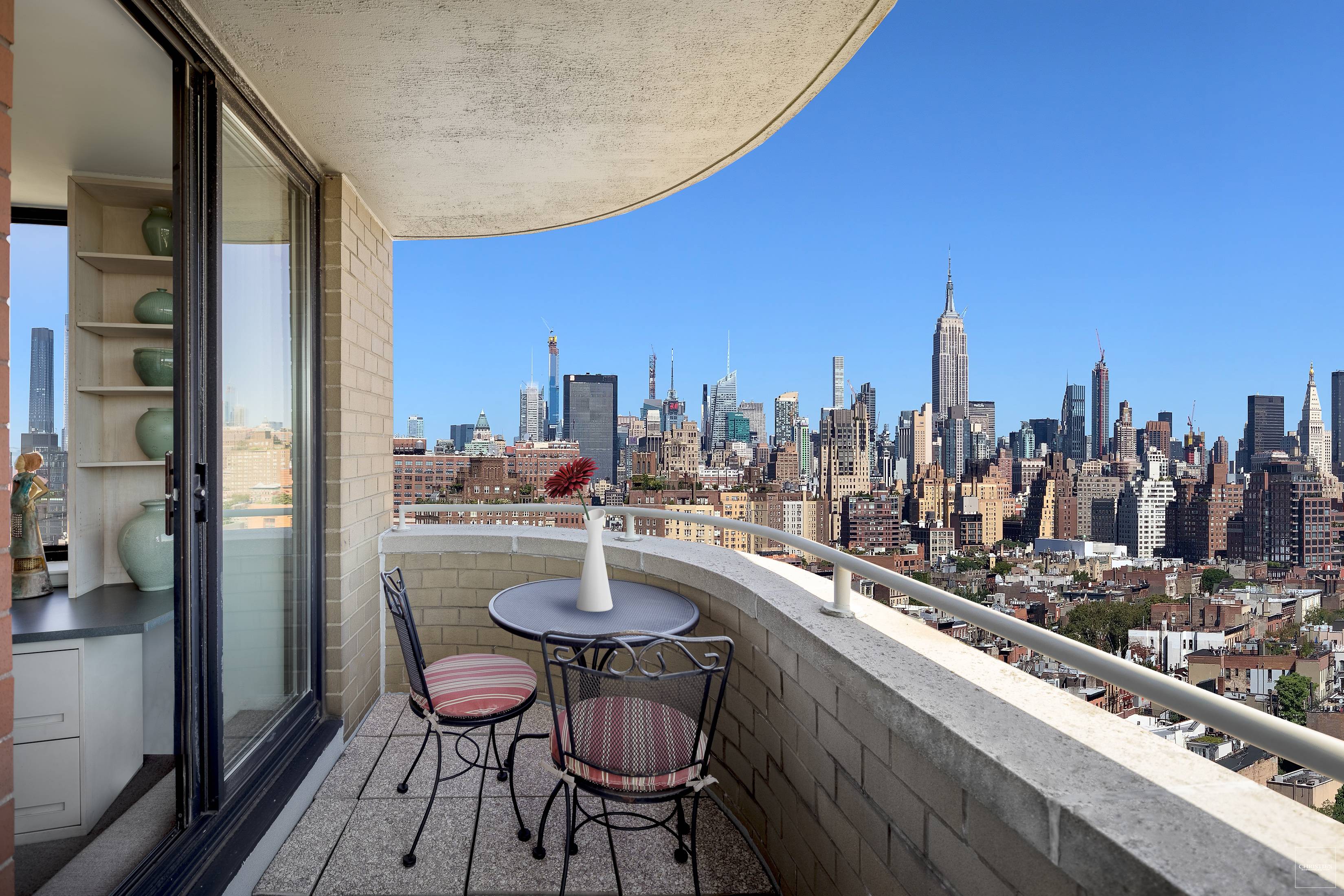 PANORAMIC HIGH FLOOR CONDO WITH TWO BALCONIES Incredible opportunity to combine two high floor one bedrooms with spectacular open Hudson River and Empire State views, wrapping around from the west ...
