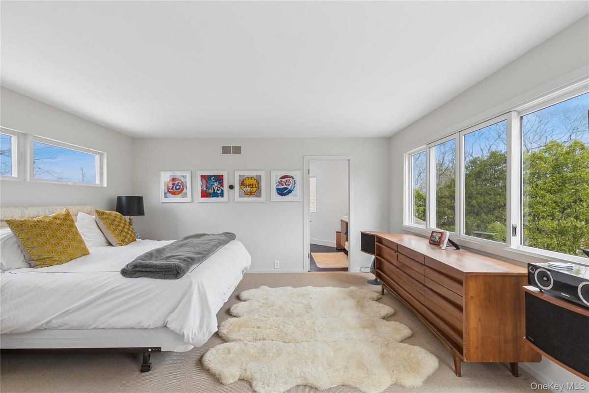 Bright Primary bedroom with balcony and ensuite bathroom