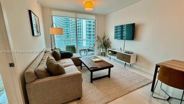 This Beautiful one bedroom plus Den unit with City and Sunset views to the West with 9 foot ceilings, floor to ceiling windows, and a private terrace.