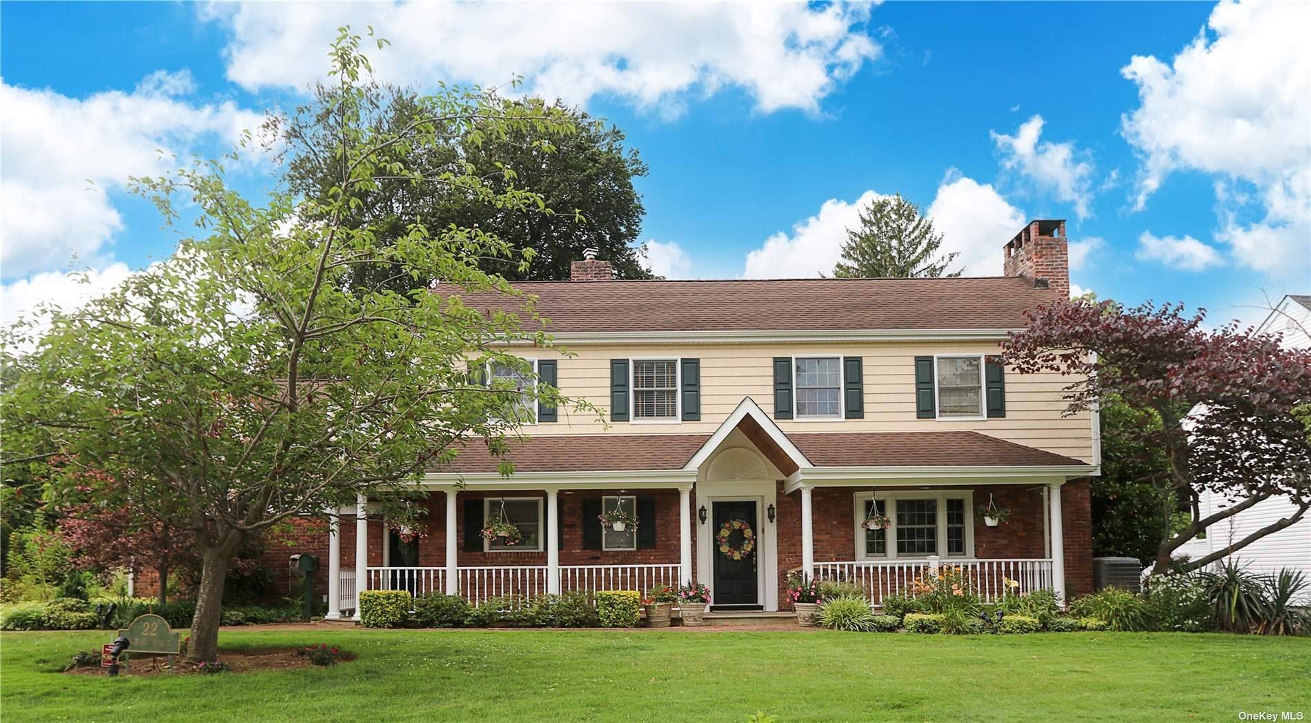 Charming, lovingly maintained 4 bedroom, 3 bath colonial features a front porch that provides an inviting and picturesque entryway.