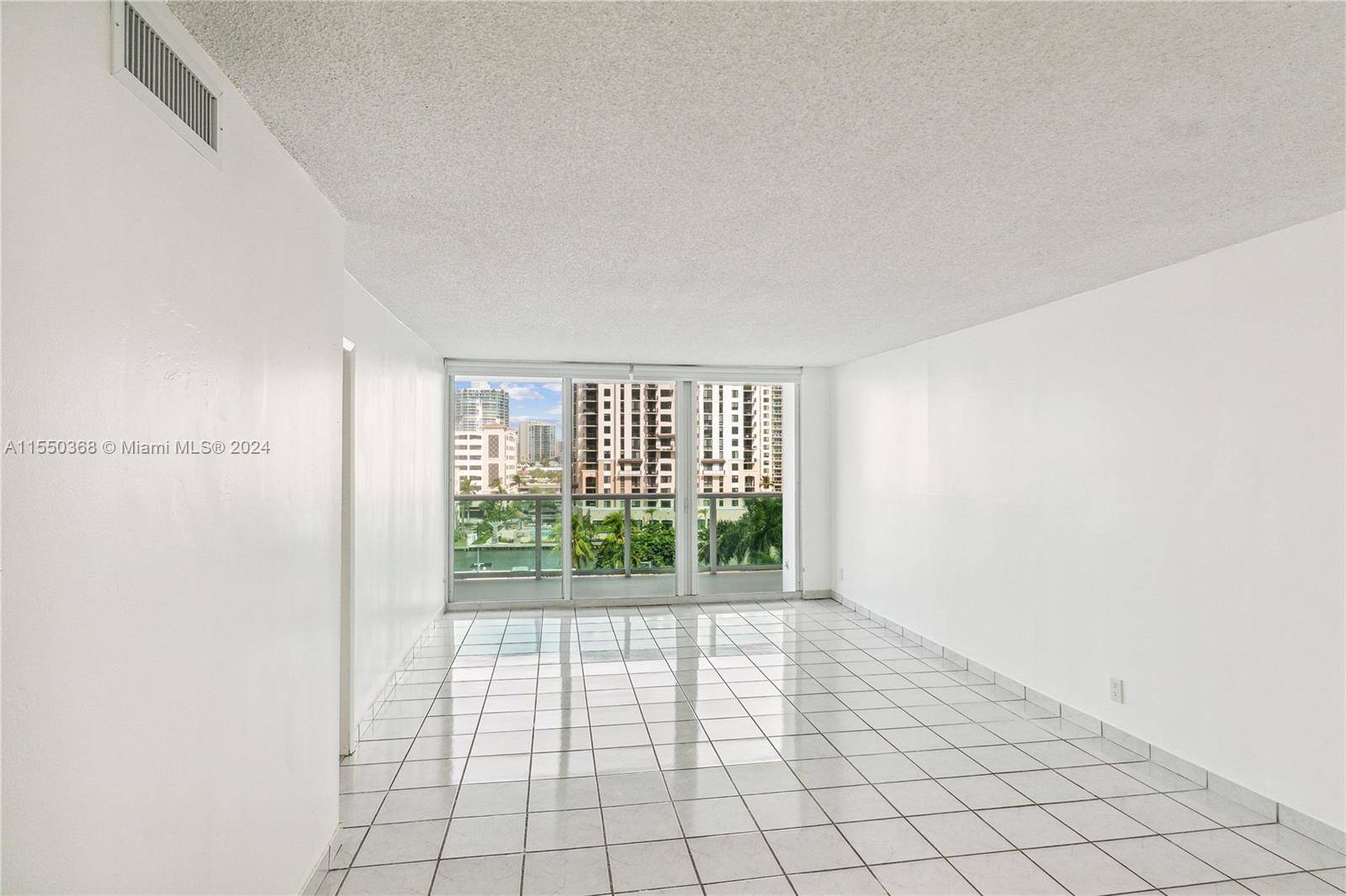 Experience breathtaking views of Sunny Isles and the serene canal from your balcony.