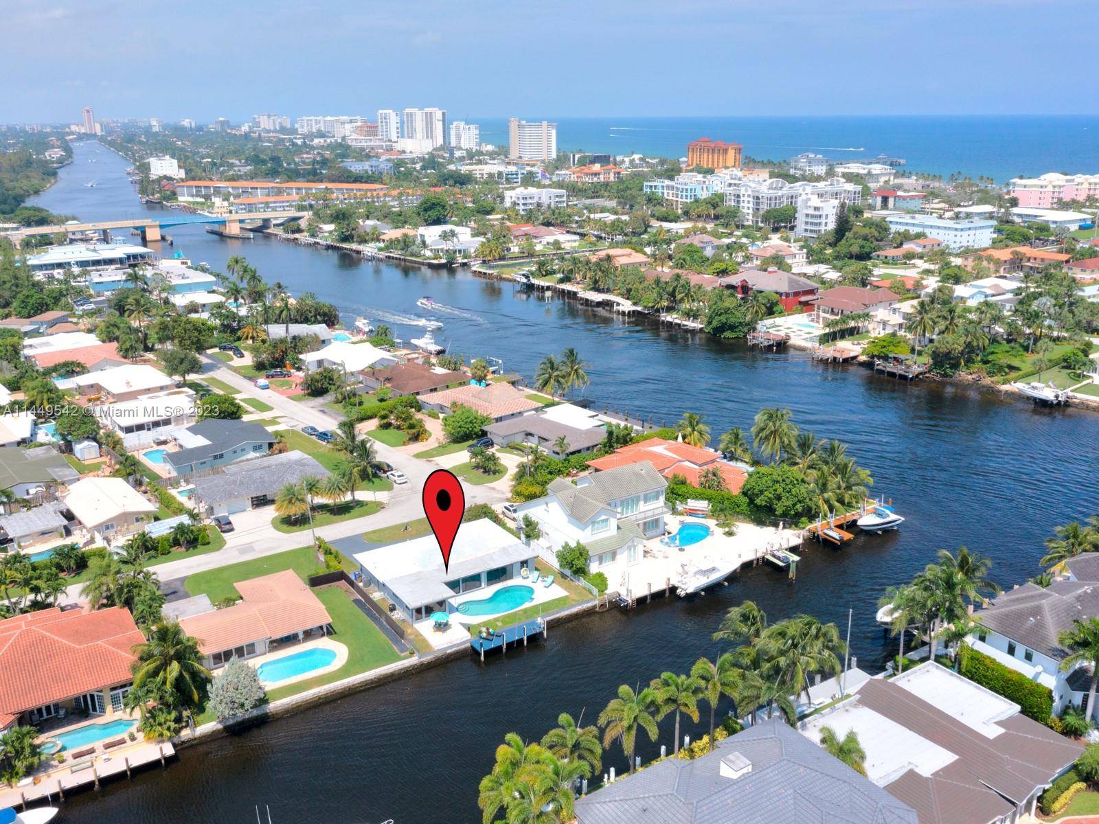 Welcome home to a show stopping waterfront home meters from the deerfield beach intercoastal waterways.
