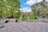Expansive yard featuring a Basketball court