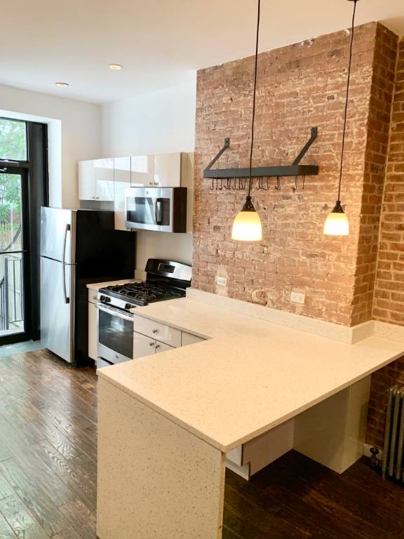 Renovated Gorgeous Classic Pre war Townhouse 2BR Residence.