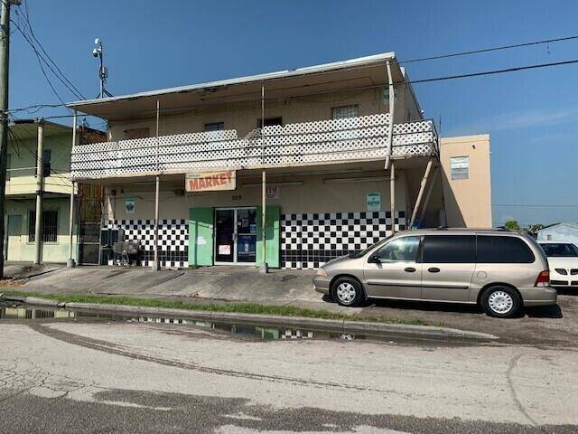 Investment opportunity. Mixed use two story commercial building with first floor well establish quick market and second floor 9 studio residential units.