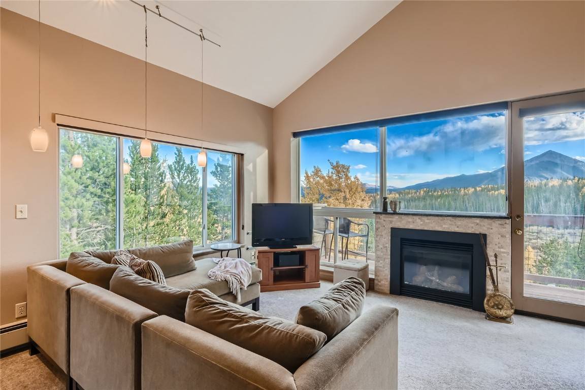A view like none other ! Step into this fabulous condo and be mesmerized by the sweep of landscape in front of you, from Buffalo Mtn over to Peak One ...
