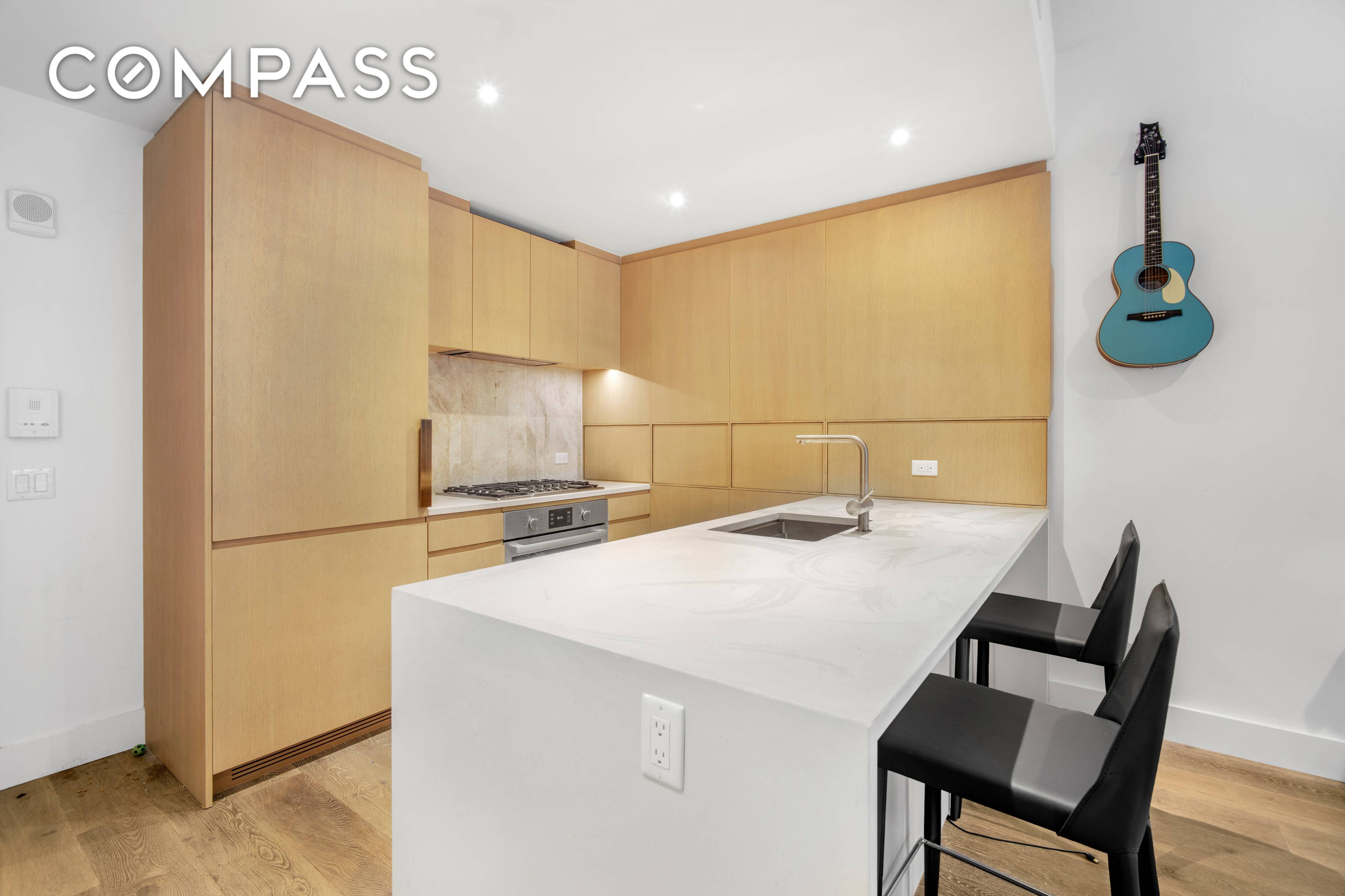 NEW LUXURY CONDO FOR SALE OR RENT Spacious Eastern facing one bedroom condo featuring an open kitchen, ample closets, wide plank oak flooring and a washer dryer.