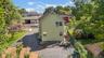 Back of property with a patio area and a balcony