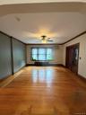 Large Family Room with hardwood floors.
