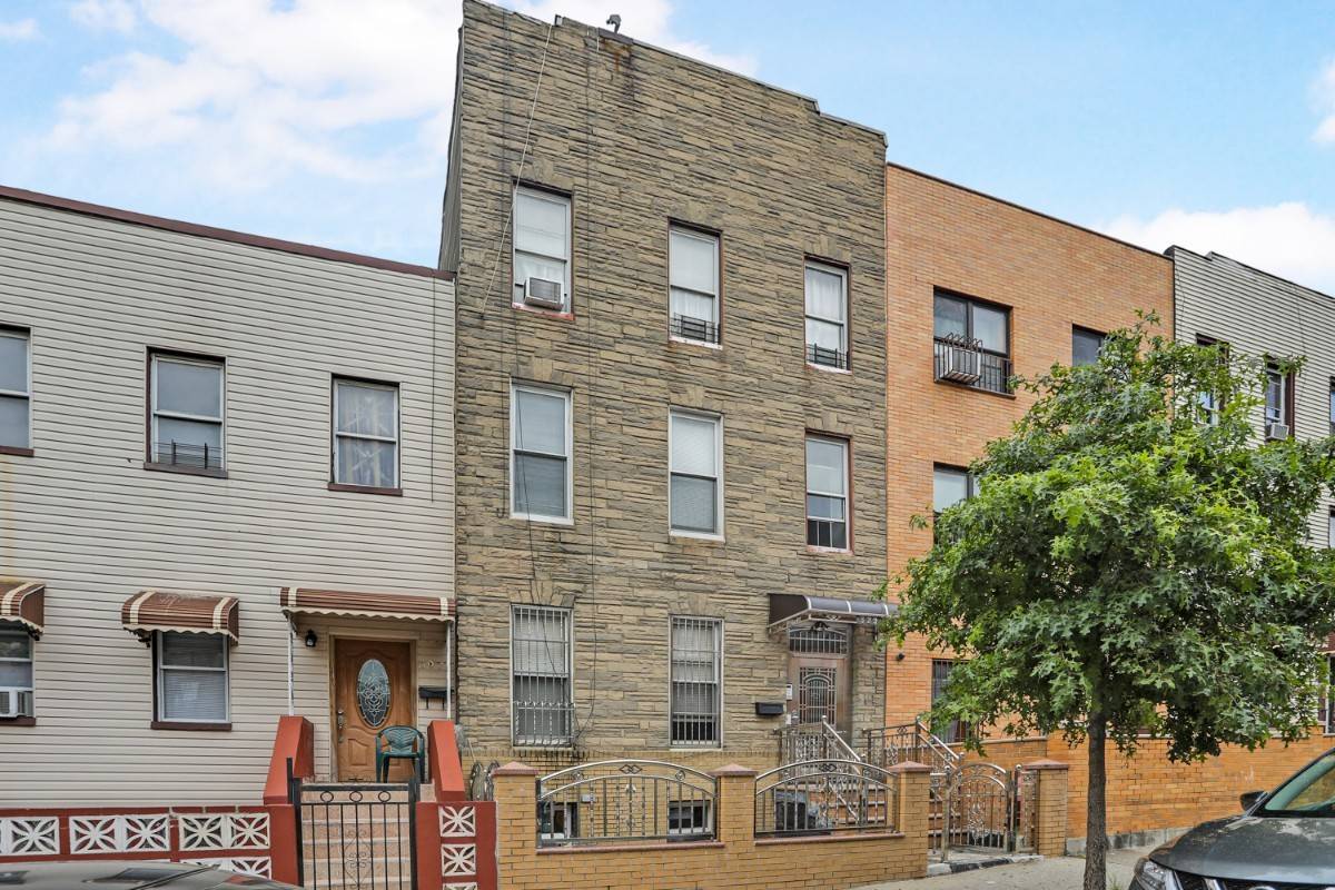 Bring your contractor ! Rare, large three family, three story townhouse with basement in Sunset Park.