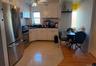 Kitchen featuring white cabinetry, ceiling fan, tasteful backsplash, light tile patterned floors, and appliances with stainless steel finishes