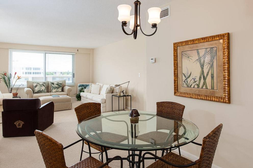 Beautiful condo on high floor renovated condo in in town oceanfront bldg with resort like amenities, including private deeded beach with beach chairs, tables and parasols and ocean front pool, ...