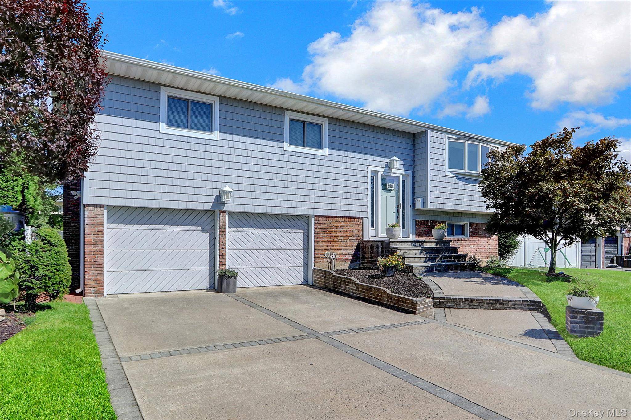 Great size Hi Ranch with 2 car garage.