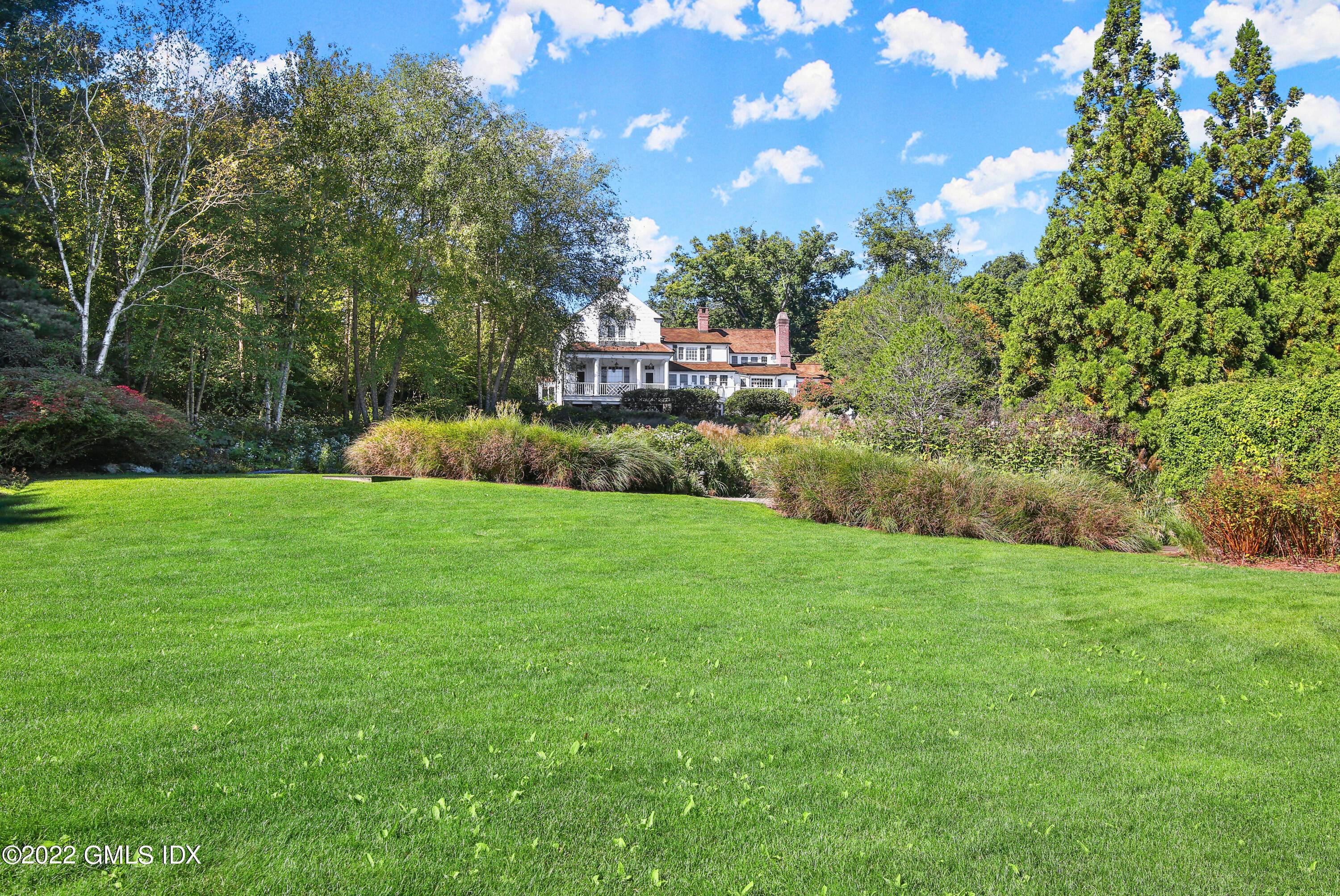 Unique 13 acre compound in private setting features renovated 1900's five bedroom Colonial ; 2, 500 sq.