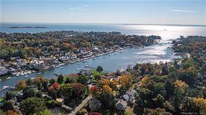 The Connecticut coastline awaits you an incredible and rare opportunity to live in Darien on the Five Mile River Road across the street from the water !
