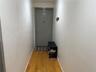 Corridor featuring hardwood / wood-style flooring