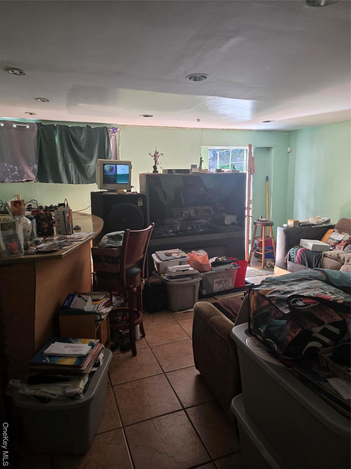 View of tiled living room