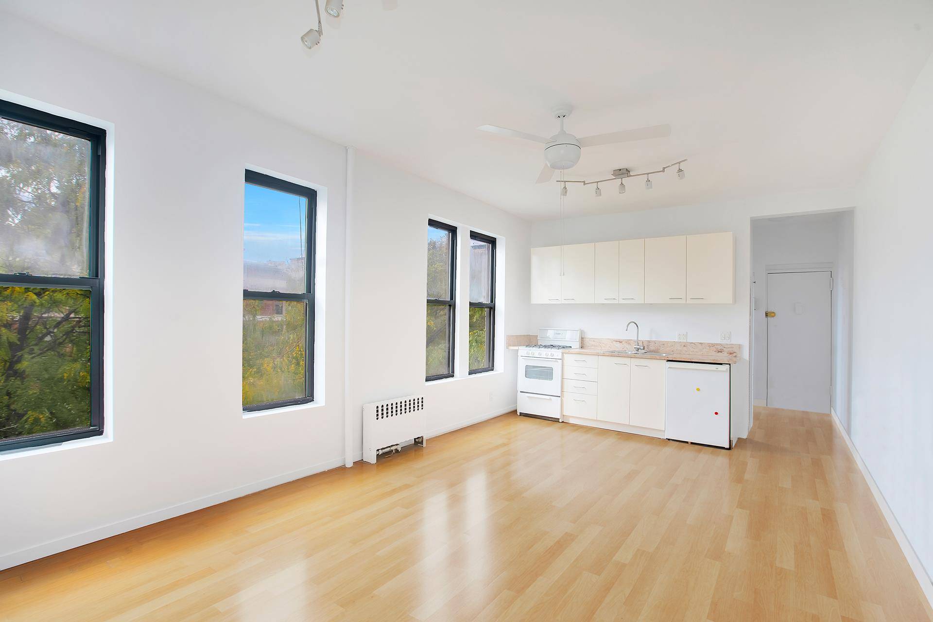 2BR 1 BA 4th Floor Walk Up in a pre war HDFC co op on Bradhurst Avenue with southern and eastern exposures overlooking and facing the expansive and peaceful Jackie ...