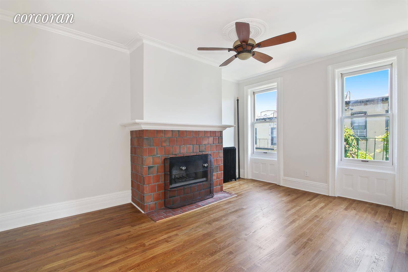 Pristine and thoughtfully renovated 2 bedroom 2 bathroom floor through home with stunning roof deck !