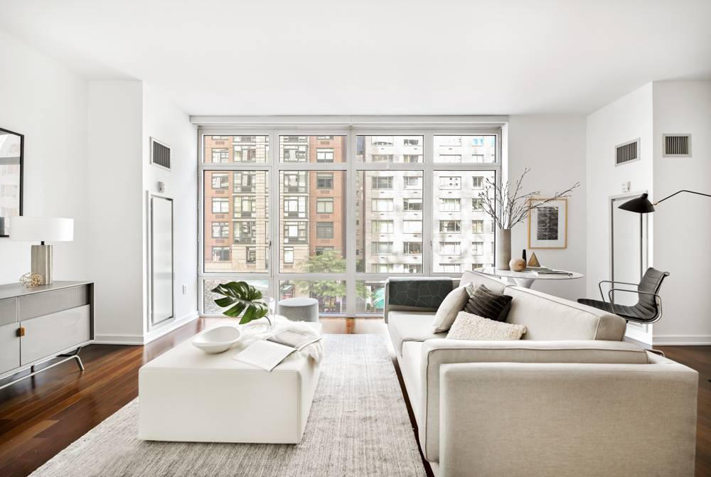 PLACE 57, one of Manhattan's premier luxury buildings is a Spectacular Condominium in the Heart of Manhattan This South facing apartment offers open city views with 10 ft.