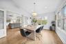 Dining space featuring lofted ceiling, light wood-type flooring, and recessed lighting