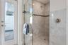 Primary ensuite bath with walk in shower