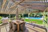Back Deck with Grill Overlooking Back Yard and Pool