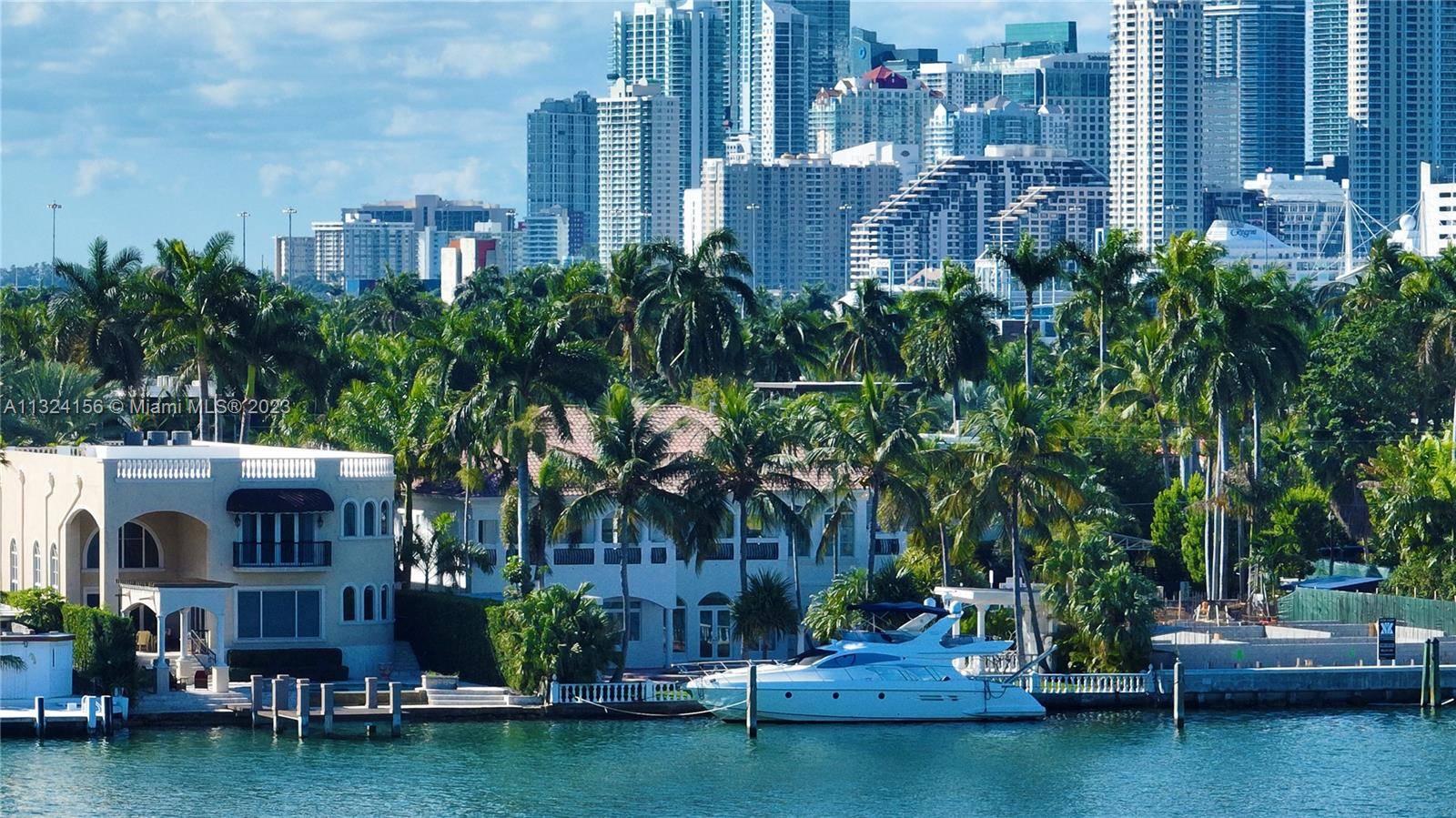 PRIME WATERFRONT ESTATE on the exclusive Hibiscus Island in Miami Beach with over 8, 000 interior SF, 9 bedrooms and 11 bathrooms on a generous 15, 750 SF lot with ...