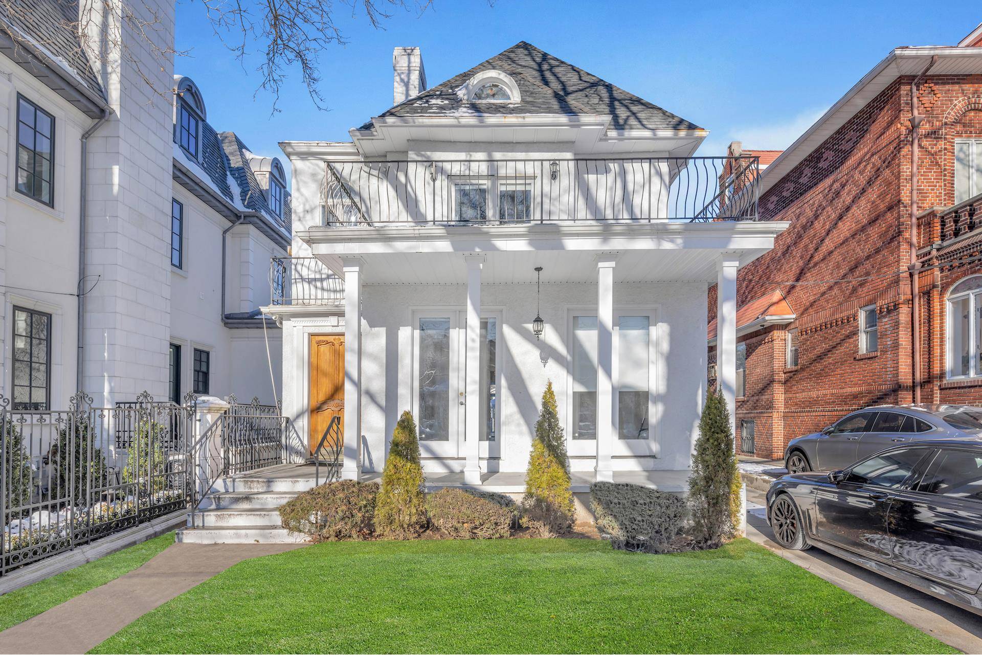 This amazing detached white stucco home sits on the best block in Bay Ridge, Brooklyn and has been a mainstay of the neighborhood since 1920 when it was built.