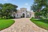 A custom coastal residence, thoughtfully designed for indoor-outdoor living!